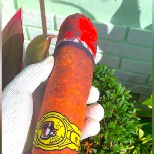Cigar shaped pet plush toy